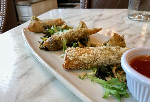 Collards get rolled and fried in Negril Village’s collard spring rolls. Photo: Brad Kaplan