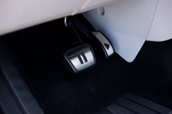 The 2025 Volkswagen ID. Buzz features brake and gas pedals adorned with pause and play symbols. (Courtesy of Volkswagen)