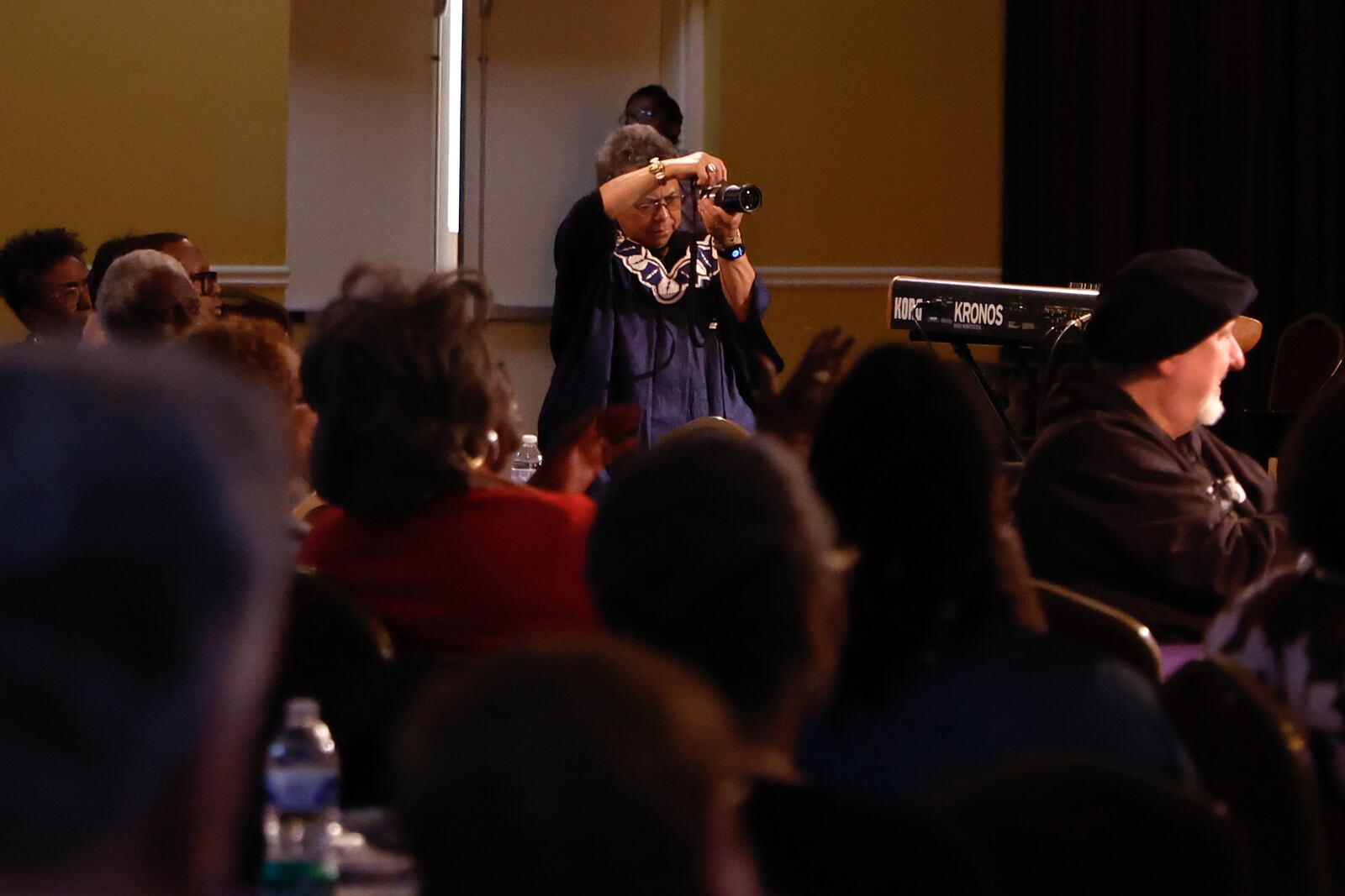 Photographer Susan “Sue” Ross takes photos during First Friday’s Jazz concert at First Congressional Church, UCC in Atlanta on Friday, Feb. 2, 2024. (Natrice Miller/ Natrice.miller@ajc.com)