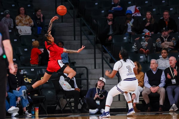 NC State Wolfpack guard Aziaha James (10) jumps to save the ball during the first half against the Ga Tech Yellow Jackets at McCamish Pavilion on Thursday, February 20, 2025, in Atlanta.
(Miguel Martinez/ AJC)