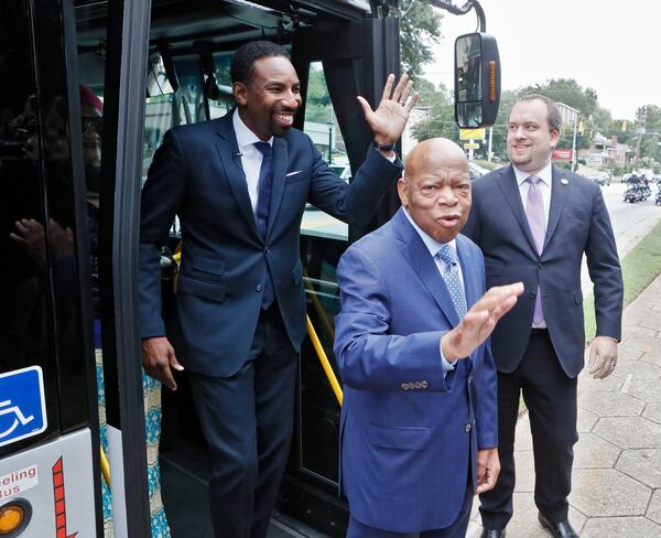 8/22/18 - Atlanta - U.S. Rep. John Lewis gets off a special MARTA bus with Councilmember Andre Dickens, who introduced the ordinance to honor Lewis.  Lewis was on hand as Freedom Parkway was renamed ÒJohn Lewis Freedom Parkway" during a dedication ceremony and sign unveiling and the Freedom Riders play space was dedicated.  BOB ANDRES  /BANDRES@AJC.COM