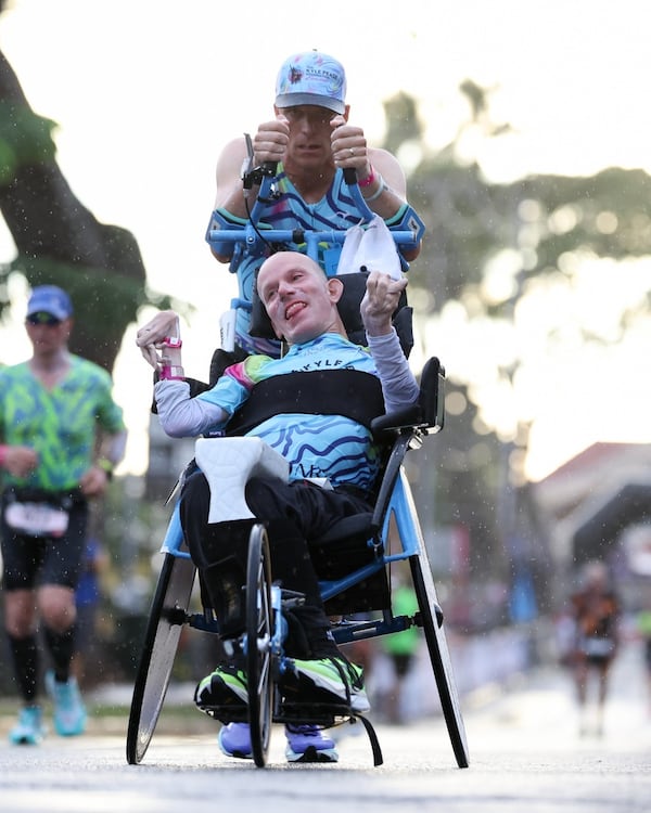 Brent (top) and Kyle competed in their first Ironman triathalon in 2011. 
Courtesy of John David Johnson II