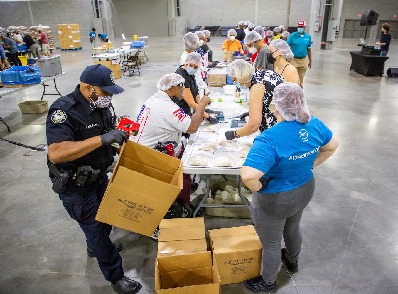 Hundreds of volunteers will pack 200,000 meals for the Atlanta Community Food Bank