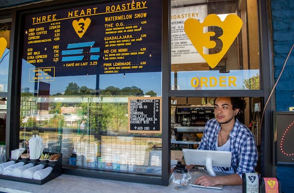 TK Hadman works at Three Heart Coffee Roasters on the Beltline near Ponce City Market in Atlanta on Thursday August 22nd, 2019. He shares his thoughts on e-scooters. The Beltline started out prohibiting motorized vehicles. In January, the Atlanta City Council passed a law allowing for e-scooters to be used on the trails. Does this compromise the Beltline's purpose?  (Photo by Phil Skinner)