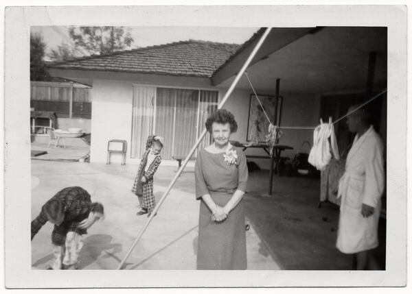 Found photos from Kevin Duffy's "Picture Taker." “Grandma stands demurely for her portrait, but the grandkids are having none of it. Their contortions prompted by this photo moment are in sharp and humorous contrast to her pose. She’s blissfully unaware of what the camera has unleashed next to her.”