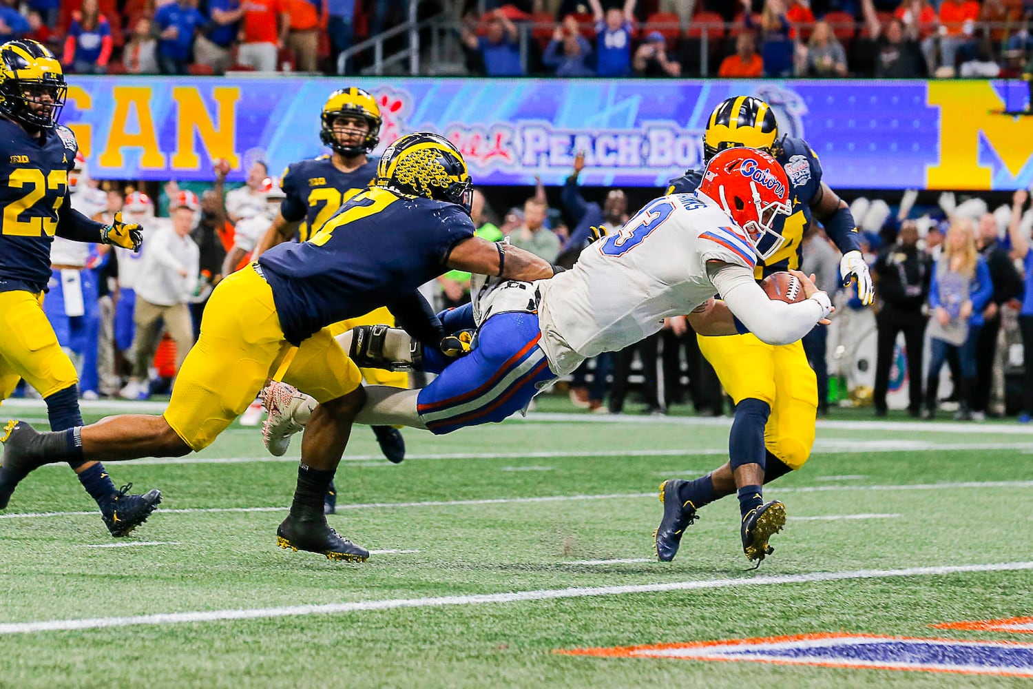 Photos: Florida, Michigan clash in Chick-fil-A Peach Bowl