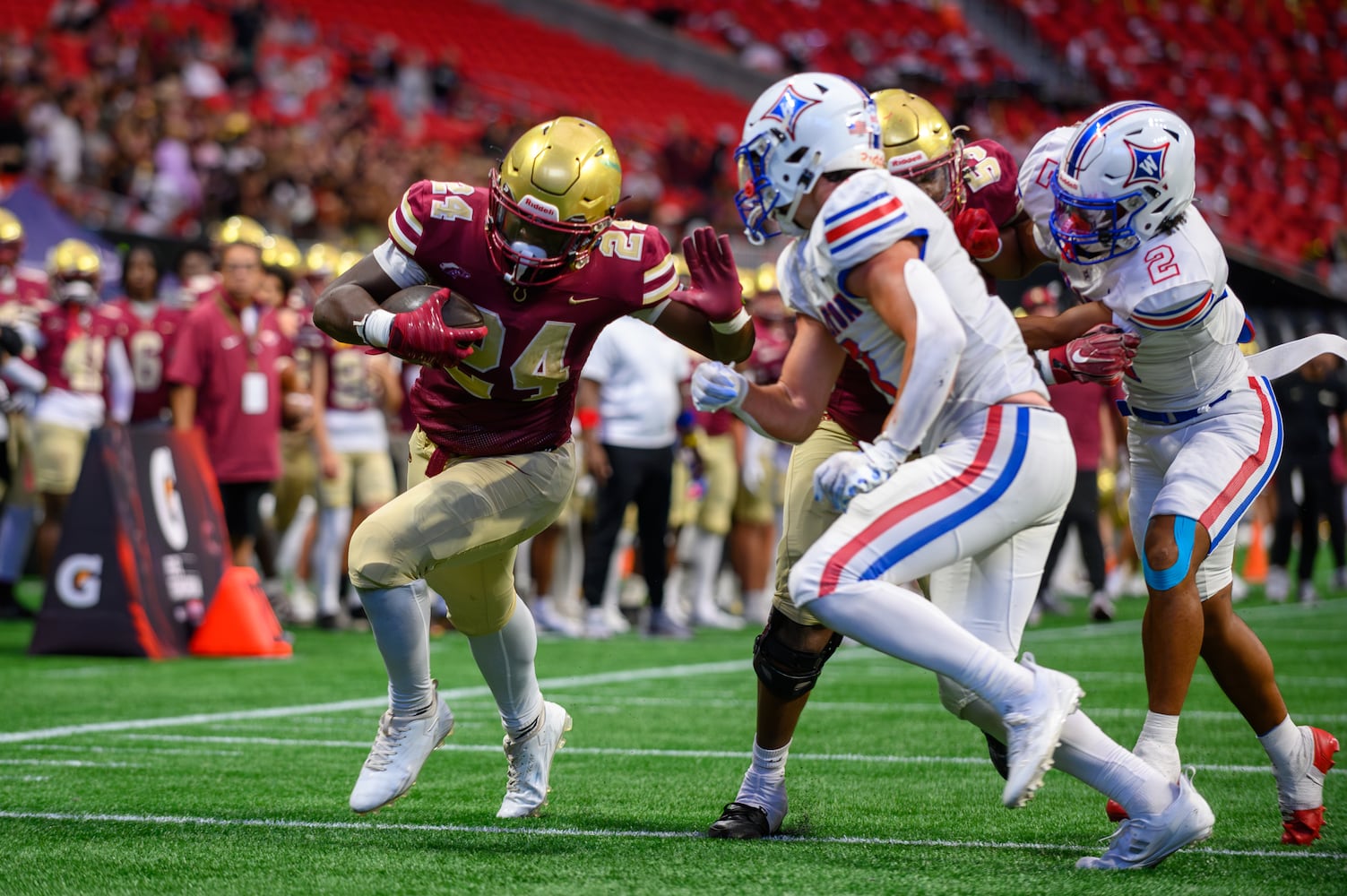 Brayden Tyson, running back for Brookwood, runs the ball to the goal line. (Jamie Spaar for the Atlanta Journal Constitution)