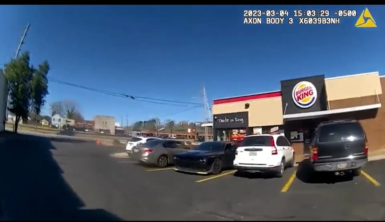 View from the dashcam of  a Cobb County Sheriff's deputy arriving at a Burger King where their boss had a beef with fast food workers