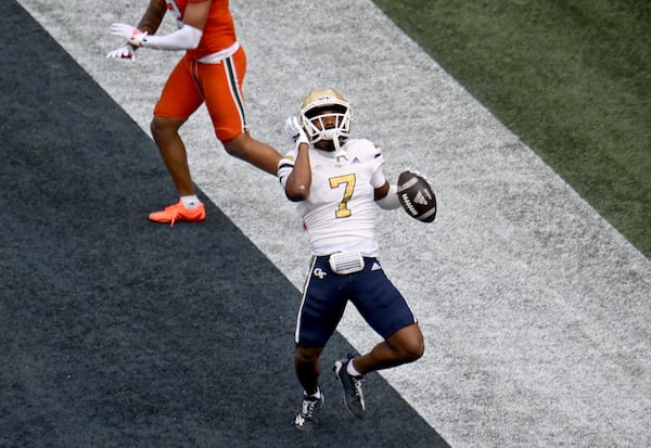  Georgia Tech wide receiver Chase Lane (7) celebrates after scoring a touchdown during the second half of an NCAA college football game at Georgia Tech's Bobby Dodd Stadium, Saturday, November 9, 2024, in Atlanta. Georgia Tech won 28-23 over Miami. (Hyosub Shin / AJC)