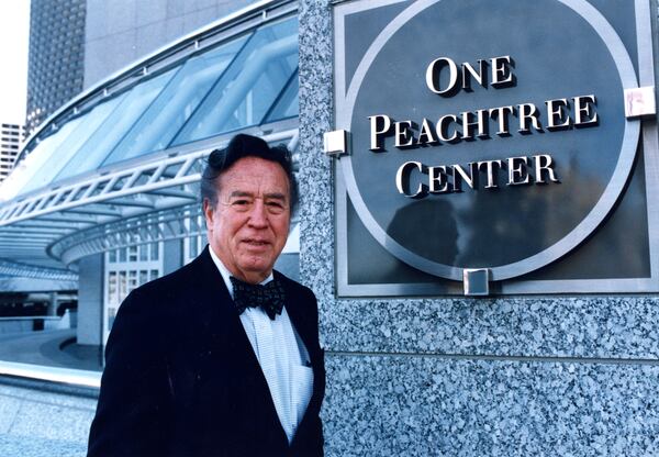 Architect and developer John Portman outside his new building One Peachtree Center in Atlanta on Dec. 8, 1992. (RICH MAHAN / AJC file photo)