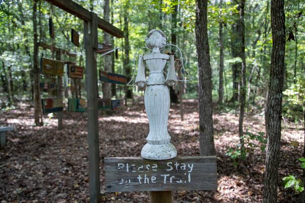 09/09/2021 — Athens, Georgia — Angel sculptures can be seen through ought the 9/11 memorial walking trail created by Bob Hart in Athens, Thursday, September 9, 2021.  (Alyssa Pointer/Atlanta Journal Constitution)