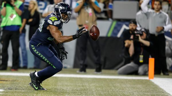 Seattle Linebacker K.J. Wright bats a loose ball out of the back of the end zone against the Detroit Lions Oct. 5, 2015, at CenturyLink Field in Seattle. The Seahawks won the game 13-10.