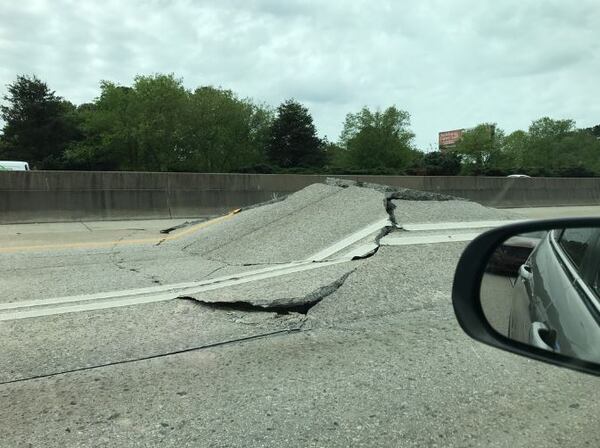 I-20 West was closed Monday morning after the highway buckled. ERIC STIRGUS / ERIC.STIRGUS@AJC.COM