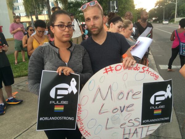  Diana Nunez and Caleb Collins outside Pulse nightclub hours after the attack that left 49 dead. Photo: Jennifer Brett, jbrett@ajc.com