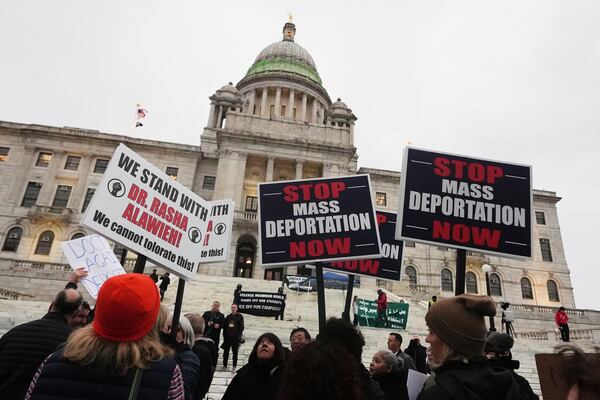 Protesters rally outside the Rhode Island State House in support of deported Brown University Dr. Rasha Alawieh, Monday, March 17, 2025, in Providence, R.I. (AP Photo/Charles Krupa)