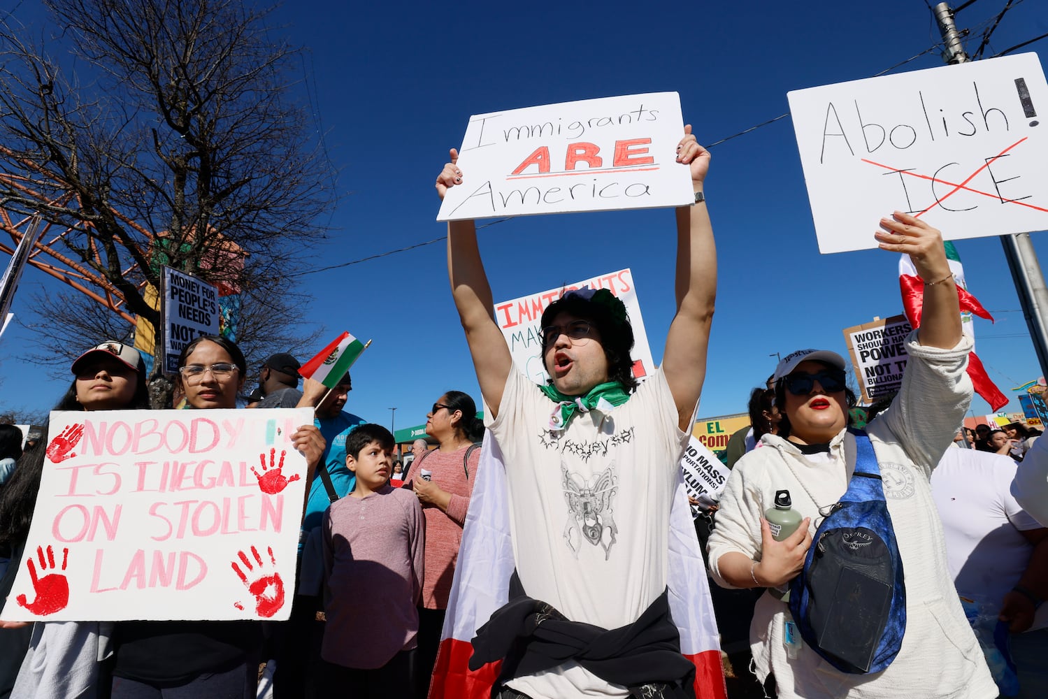 Eduardo Martinez, center, chants as he holds a sign at Plaza Fiesta as he participates in a peaceful protest supporting immigrants on Saturday, February 1, 2025, in response to a recent immigration arrest in Georgia.
(Miguel Martinez/ AJC)