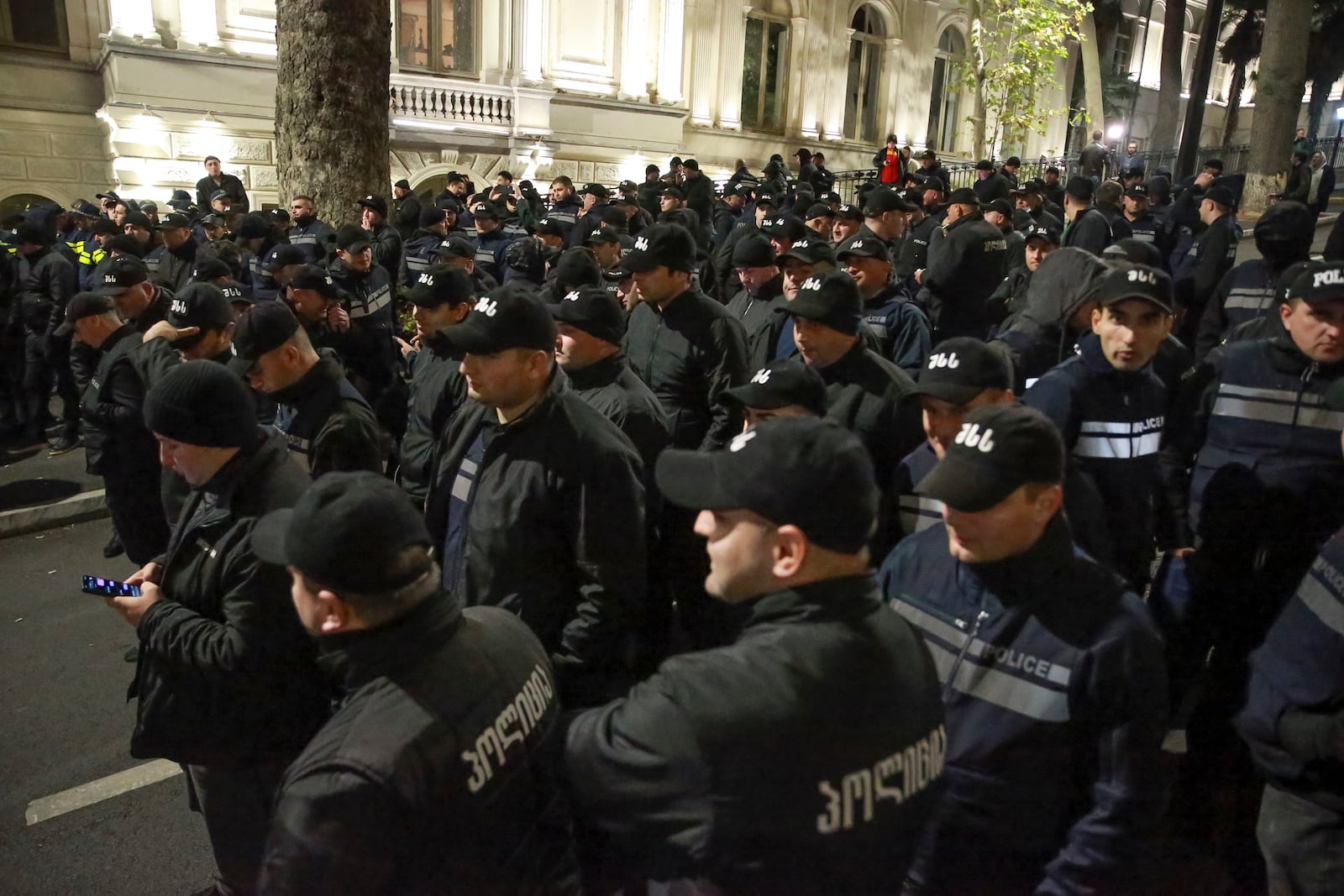 Police stand ready during an opposition protest against the results of the parliamentary election in Tbilisi, Georgia, on Monday, Oct. 28, 2024. (AP Photo/Zurab Tsertsvadze)