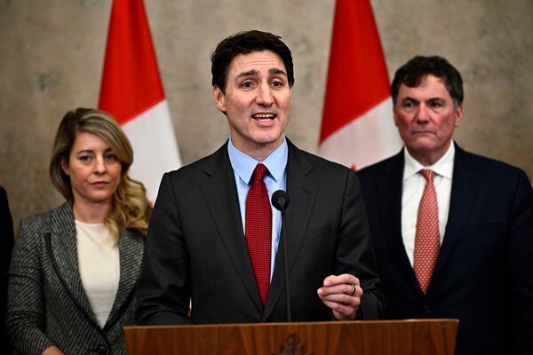 Canadian Prime Minister Justin Trudeau addresses the news media after U.S. President Donald Trump signed an order to impose stiff tariffs on imports from Canada, China, and Mexico on Saturday.
