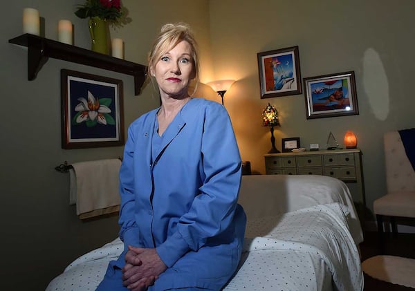 Clinical massage associate, Jane Johnson, at her therapy room in Marietta.