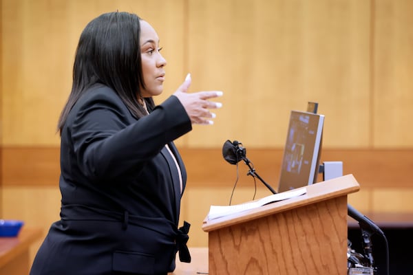 Fulton County District Attorney Fani Willis plans to announce this summer — sometime between July 11 and Sept. 1 — whether she will bring charges against former President Donald Trump or any of his allies. (Miguel Martinez for the AJC)