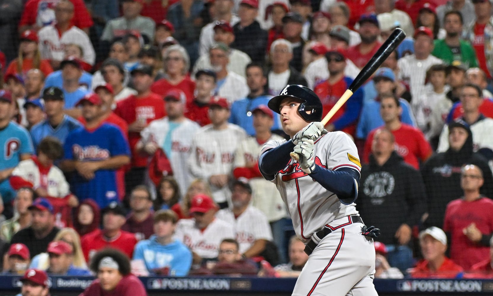 Atlanta Braves’ Austin Riley hits a solo home run against the Philadelphia Phillies during the fourth inning of NLDS Game 4 at Citizens Bank Park in Philadelphia on Thursday, Oct. 12, 2023.   (Hyosub Shin / Hyosub.Shin@ajc.com)