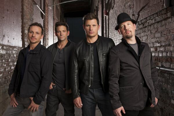 98 Degrees, (from left) Drew Lachey, Jeff Timmons, Nick Lachey and Justin Jeffre, will perform a holiday show at the Aronoff Center for the Arts in Cincinnati on Dec. 15. CONTRIBUTED