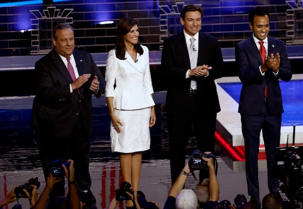 Former New Jersey Gov. Chris Christie, from left, former South Carolina Gov. Nikki Haley, Florida Gov. Ron DeSantis of Florida, entrepreneur Vivek Ramaswamy, and South Carolina U.S. Sen. Tim Scott take the stage for the third Republican presidential debate in November in Miami. Christie has used the debates to attack former President Donald Trump, the GOP front-runner, who has not participated in the events. He also has attacked Ramaswamy as a blowhard who, he said, "is playing the role of a younger Donald Trump on that stage.” (Scott McIntyre/The New York Times)
                      