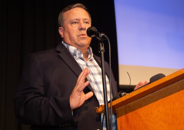 Commissioner, District Two Bob Ott talks to a packed house during a community meeting to address concerns over toxic emissions at Campbell Middle School in Smyrna Tuesday, July 30, 2019. STEVE SCHAEFER / SPECIAL TO THE AJC