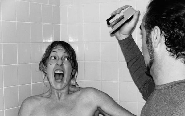 On Alfred Hitchcock Day and Stapler Day, Jyn Hall and Steven Keck re-enacted the shower scene from “Psycho,” with a threatening stapler. The Norcross couple are celebrating a holiday every day this year — and some days they celebrate more than one holiday at a time. CONTRIBUTED BY JYN HALL AND STEVEN KECK