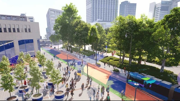 This rendering shows Georgia State University's plans for Woodruff Park. The school wants to install new sidewalks, a realigned streetcar platform, façade improvements to the 25 Park Place building and plaza, and other pedestrian-oriented features. Plans call for the block of Park Place between Auburn and Edgewood avenues to be closed to vehicle traffic and only open to the Atlanta Streetcar. The streetcar stop will be moved a few meters to the south. Image credit: Georgia State University.