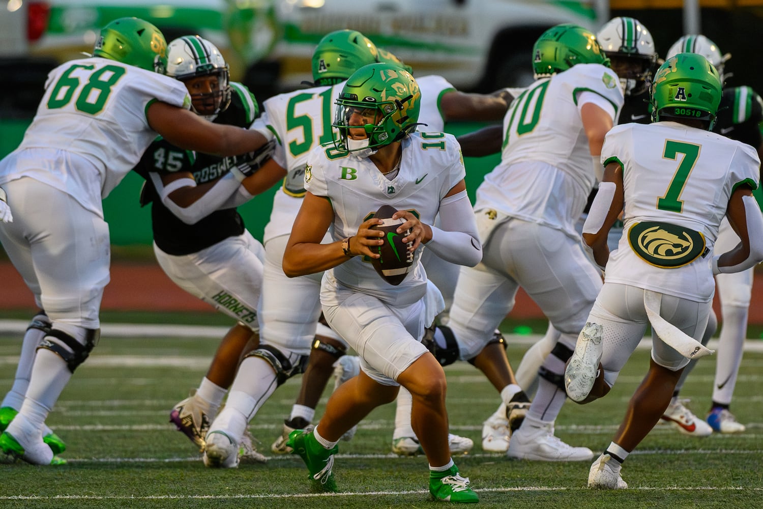 Buford quarterback Dayton Raiola looks to make a pass. (Jamie Spaar for the Atlanta Journal Constitution)