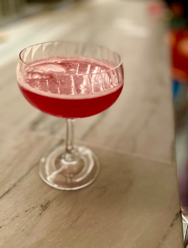 Southern National’s Jamaica Agua Fresca is a refreshing complement to a menu of Southern-inspired fare with global influence. (Angela Hansberger for The Atlanta Journal-Constitution)