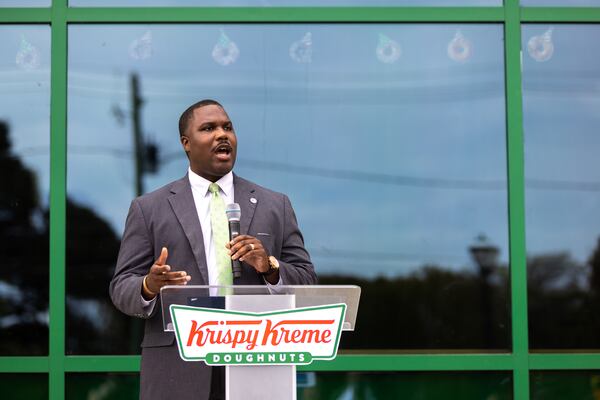 Greg Clay, executive director of Atlanta’s Office of Constituent Services, speaks Friday at the new Krispy Kreme.