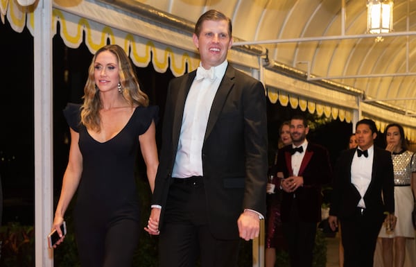 Eric Trump and Lara Trump arrive for a New Year's Eve gala with President Donald Trump at the Mar-a-Lago club in Palm Beach, Fla., Dec. 31, 2017. (Greg Lovett / The Palm Beach Post)