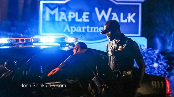 A man died after a gunbattle with police early Thursday morning in DeKalb County. JOHN SPINK / JSPINK@AJC.COM