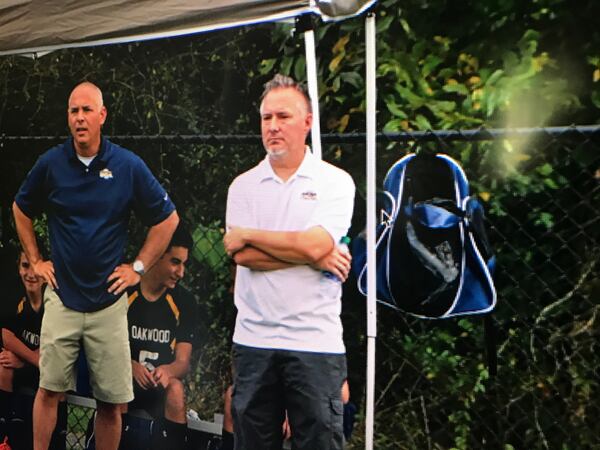 Daniel L. Ray (right), the headmaster of a Christian school in Chickamauga, coaching soccer. Photo courtesy of Daniel L. Ray