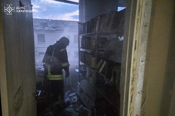 In this photo provided by the Ukrainian Emergency Service, firefighters put out the fire at a lyceum following a Russian drone attack in Bohodukhiv, Kharkiv region, Ukraine, Saturday, March 15, 2025. (Ukrainian Emergency Service via AP)