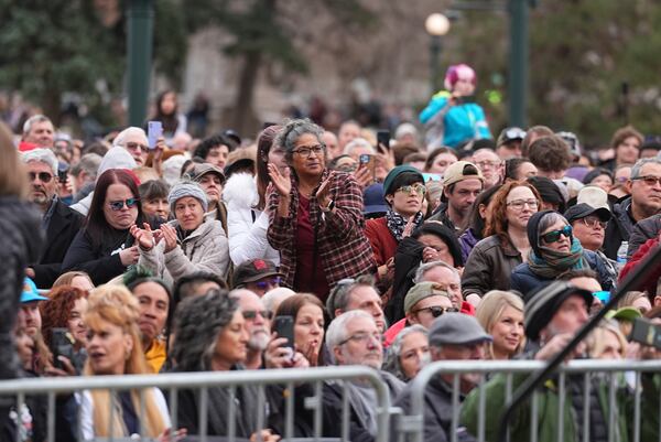 People cheer as Sen. Bernie Sanders, I-Vt., and Rep. Alexandria Ocasio-Cortez, D-N.Y., speak during a stop of their "Fighting Oligarchy" tour that filled Civic Center Park, Friday, March 21, 2025, in Denver. (AP Photo/David Zalubowski)