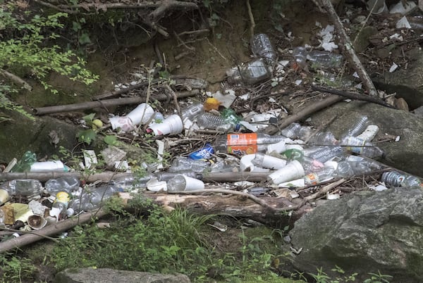 Plastic pollution is a global concern, but there are examples right here in Georgia. Here, trash and plastic pollution cover the banks of the tributary of Proctor Creek. Georgians throw away 1 million tons of plastic each year. Only 9% of total plastic waste in the U.S. gets recycled. BOB ANDRES / BANDRES@AJC.COM