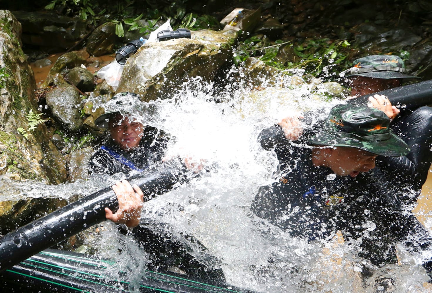 Photos: Rescuers work to free soccer team, coach trapped in Thai cave