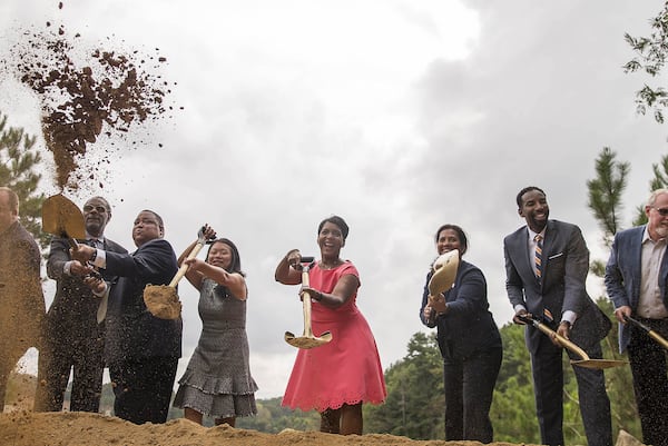 Atlanta Mayor Keisha Lance-Bottoms (center), Atlanta Parks and Recreation commissioner Amy Phuong (third from left) and Atlanta Department of Watershed Management Commissioner Kishia Powell (third from right) are joined by members of the Atlanta City Council, Atlanta Beltline Inc. and the Atlanta Beltline Partnership as they break ground for the new Westside Park at the Bellwood Quarry in Atlanta, Thursday, September 6, 2018. The park, planned for years as both a recreational center and reservoir for drinking water, has been seen as a potential catalyst for redevelopment of the city’s northwest side. (ALYSSA POINTER/ALYSSA.POINTER@AJC.COM)