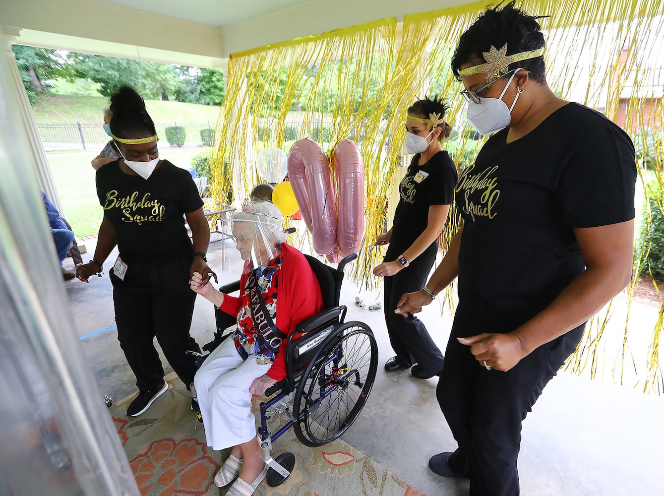 Photos: COVID-19 survivor celebrates 100th birthday