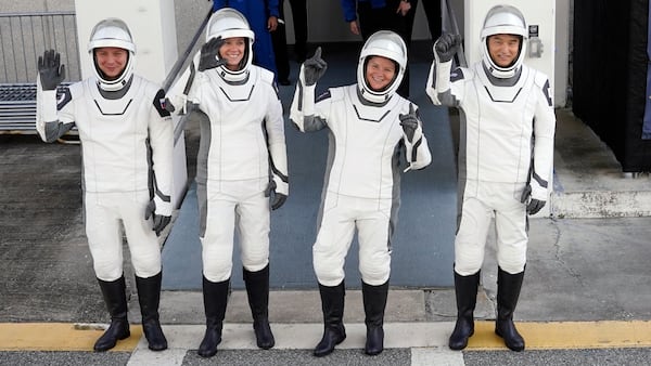 Crew10 members, from left, cosmonaut Kirill Peskov, astronaut Nichole Ayers, astronaut Anne McClain and JAXA astronaut Takuya Onishi leave the Operations and Checkout building before heading to Launch Pad 39-A at the Kennedy Space Center in Cape Canaveral, Fla., for a mission to the International Space Station in Cape Canaveral, Fla., Friday, March 14, 2025. (AP Photo/John Raoux)