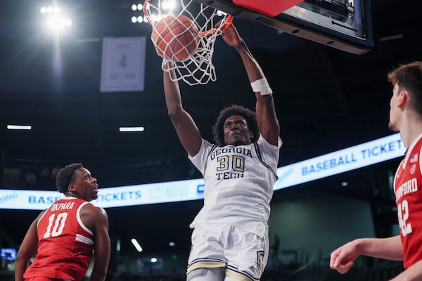 Georgia Tech forward Ibrahim Souare (30) dunks during the second half against Stanford at McCamish Pavilion, Wednesday, February, 12, 2024, in Atlanta. Georgia Tech won 60-52. (Jason Getz / AJC)