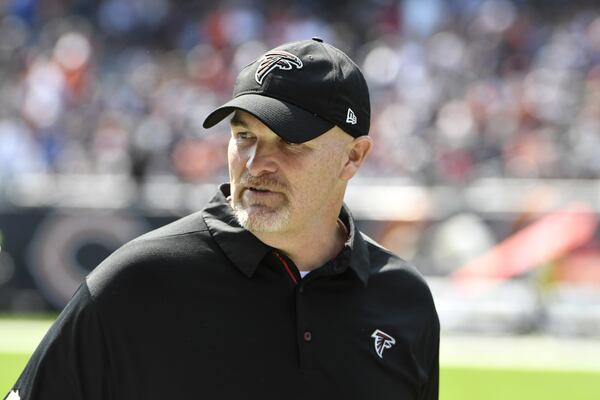 CHICAGO, IL - SEPTEMBER 10:  Head coach Dan Quinn of the Atlanta Falcons stands on the sidelines during the game against the Chicago Bears at Soldier Field on September 10, 2017 in Chicago, Illinois.  (Photo by David Banks/Getty Images)