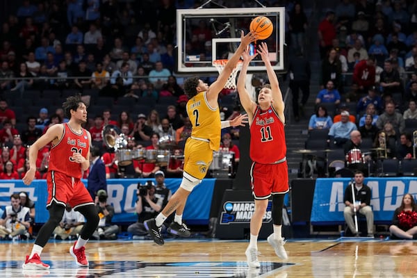 Alabama State guard Micah Simpson (2) makes a steal against Saint Francis guard Riley Parker (11) during the first half of a First Four college basketball game in the NCAA Tournament, Tuesday, March 18, 2025, in Dayton, Ohio. (AP Photo/Jeff Dean)