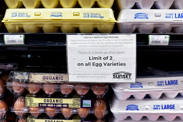 A sign is mounted on a shelve of eggs at a grocery store in Northbrook, Ill., Feb. 28, 2025. (AP Photo/Nam Y. Huh, file)