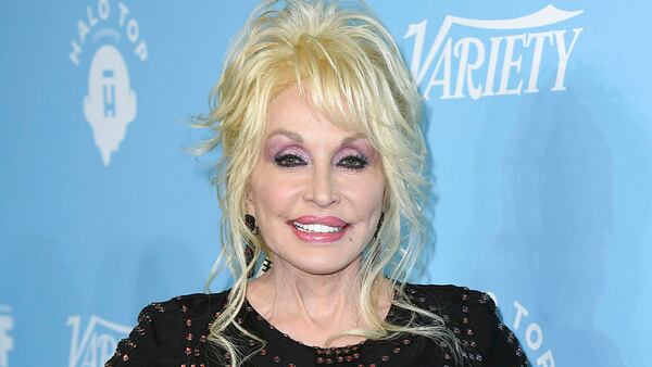 Dolly Parton recorded a new duet version of her 1971 song "Here I Am" with Sia. (Photo by Jordan Strauss/Invision/AP, File)