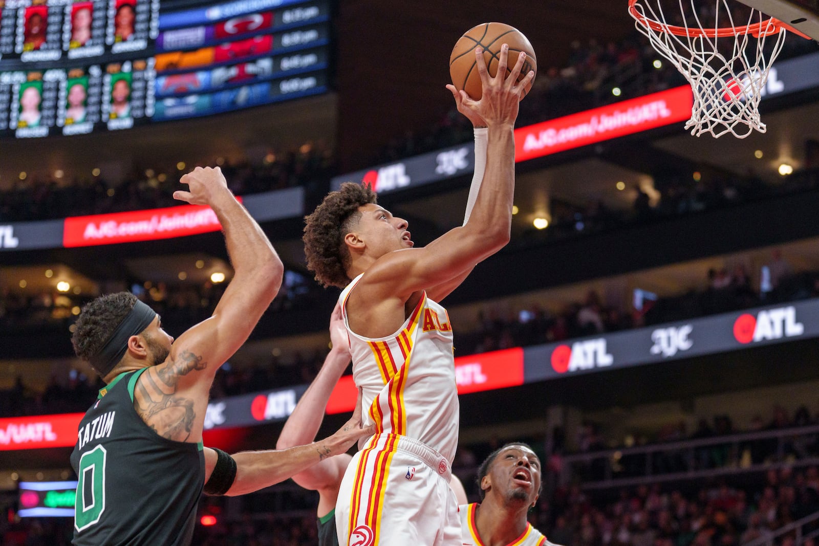 Atlanta Hawks forward Jalen Johnson (1) goes up for a layup during the first half of an NBA basketball game against the Boston Celtics, Monday, Nov. 4, 2024, in Atlanta. (AP Photo/Jason Allen)