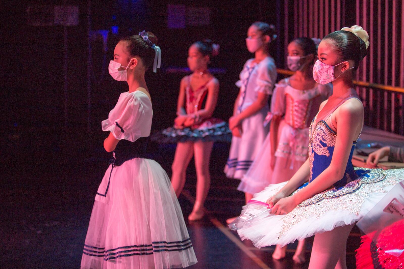 A Youth America Grand Prix ballet scholarship competition was held at the Infinite Energy Theater in Gwinnett County last month with strict COVID-19 precautions. The organization required masks, limited the number of audience members, conducted temperature checks and allowed dancers to perform with or without masks. (Jenni Girtman for The Atlanta Journal-Constitution)